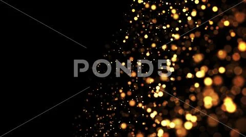 Gold particles glisten in the air, gold sparkles in a viscous fluid have the Stock Photos