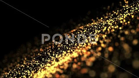 Gold particles glisten in the air, gold sparkles in a viscous fluid have the Stock Photos