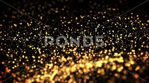 Gold particles glisten in the air, gold sparkles in a viscous fluid have the Stock Photos