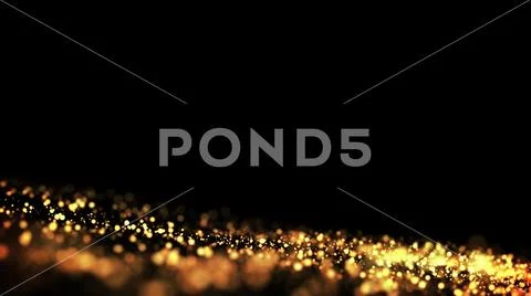 Gold particles glisten in the air, gold sparkles in a viscous fluid have the Stock Photos