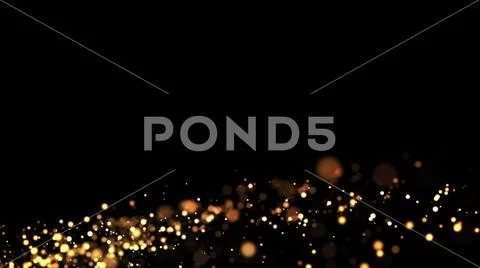 Gold particles glisten in the air, gold sparkles in a viscous fluid have the Stock Photos