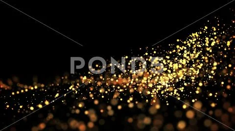 Gold particles glisten in the air, gold sparkles in a viscous fluid have the Stock Photos