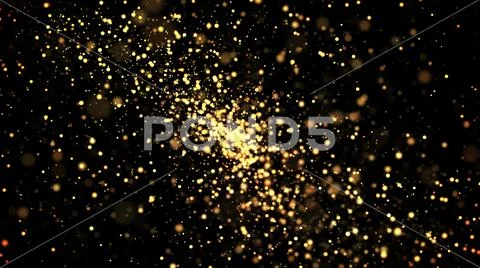 Gold particles glisten in the air, gold sparkles in a viscous fluid have the Stock Photos