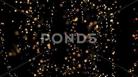 Gold particles glisten in the air, gold sparkles in a viscous fluid have the Stock Photos