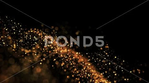 Gold particles glisten in the air, gold sparkles in a viscous fluid have the Stock Photos