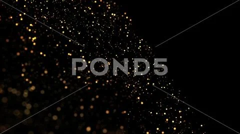 Gold particles glisten in the air, gold sparkles in a viscous fluid have the Stock Photos