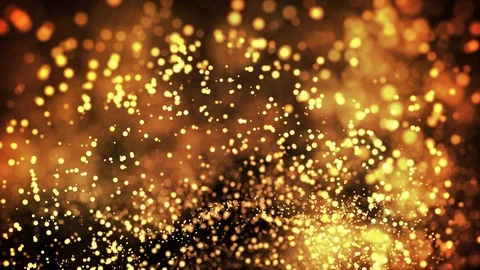 Gold particles in liquid float and glisten. Background with glittering golden Stock Footage 109297138