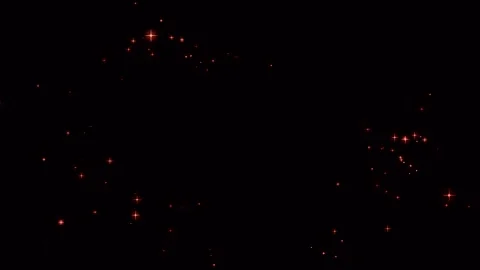 Gold particles move particles from below. Gold dust particles flicker on the bla Stock Footage 263954663