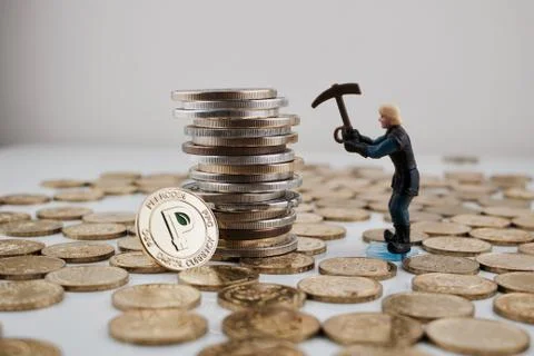 Gold peercoin Stock Photos