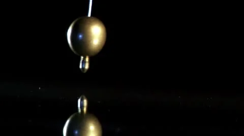 Gold pendulum Video stock 8970355
