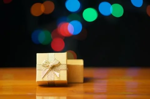 Gold present box open lid have colorful bokeh explode Stock Photos