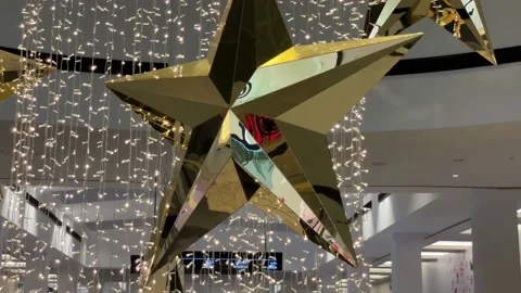 A gold reflected star close up short Stock Footage 154027798
