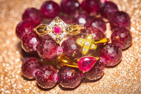 Gold ring and ruby beaded bracelet 스톡 사진
