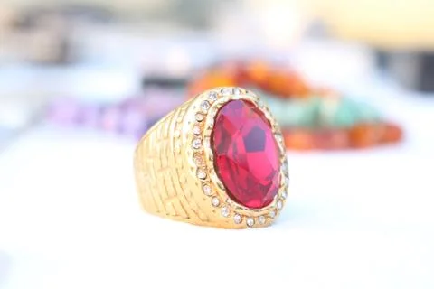 Gold ring on blurry background Stock Photos