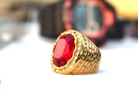Gold ring on blurry background Stock Photos