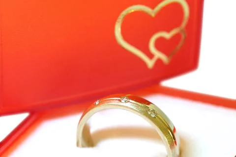 Gold ring with daimonds in red box Stock Photos