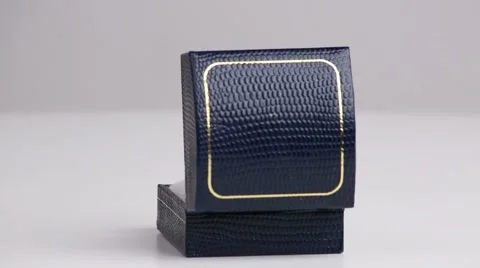 Gold ring with a diamond in the blue box Stock Footage 58514595