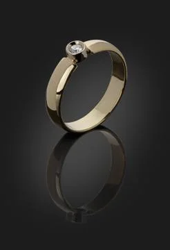 Gold ring with a diamond Stock Photos