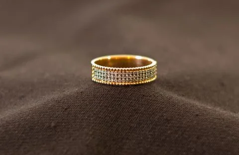 Gold ring with diamonds Stock Photos