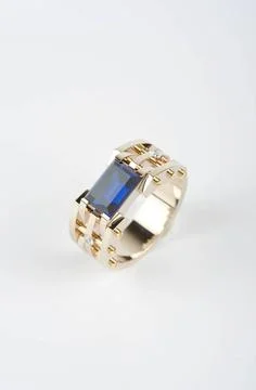 Gold ring gold ring with big blue gem and smaller diamonds Copyright: xZoo... Stock Photos