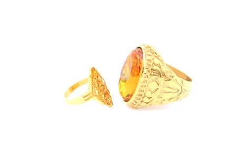 Gold ring on isolated white background Stock Photos
