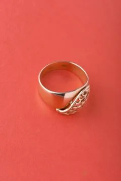 Gold ring on red Foto stock