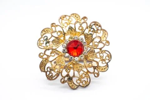 Gold ring with ruby ??and diamonds, on a white background for women's fashion 库存照片