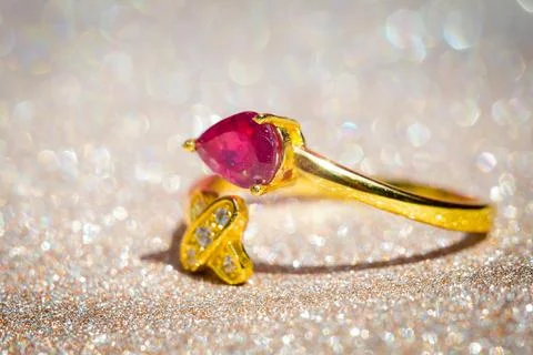 Gold ring with teardrop ruby stone Stock Photos