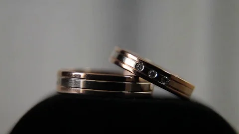 Gold rings in light closeup Stock Footage 71797113