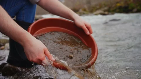 Gold rush,gold mining gold mining digger outdoor,Finding gold Stock Footage 234631958