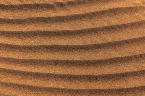 Gold sand texture close up at sunset Foto stock