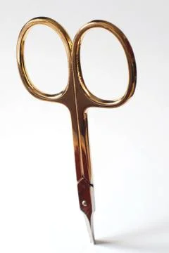 Gold scissors Stock Photos