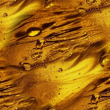 Gold seamless background with splashes and drops of liquid gold. An abstracti Stock Illustration