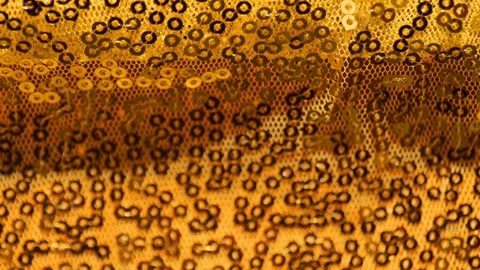 Gold sequin background. Christmas Gold fabric Stock Footage 341618677