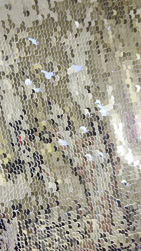 Gold sequin texture background, reflective sparkling sunlight Abstract vertical Stock Footage 338324871