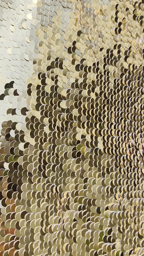 Gold sequin texture background, reflective sparkling sunlight Abstract vertical Stock Footage 338324917