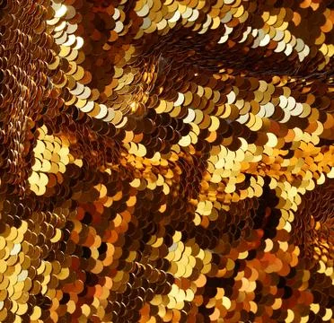 Gold sequin texture background with reflective sparkling . Abstract christmas ba Stock Photos