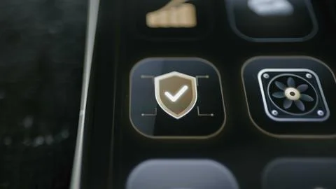 Gold shield with a confirmation check appears 스톡 사진