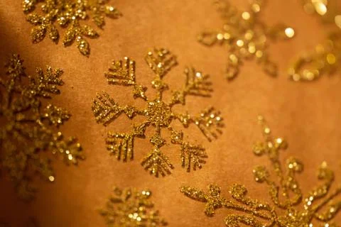 Gold snowflake glitter pattern Stock Photos