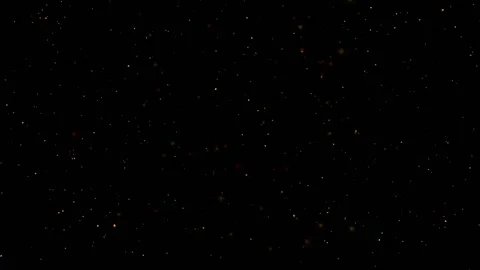 Gold sparkles on a black screen continuously rise from bottom to top. Video stock 150852387