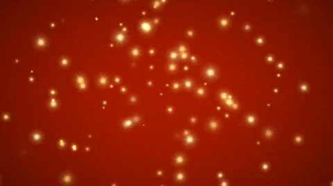 Gold sparkles on red background 库存影片 575013