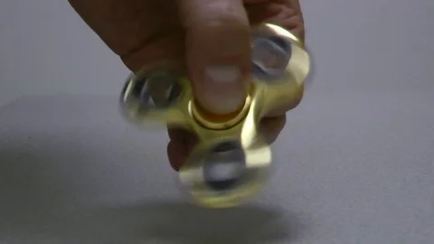 Gold spinner rotate on the white background. Video stock 82243766