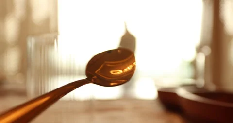 Gold Spoon on a dining table Stock Footage 329620728