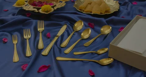 Gold stainless cutlery set on the table Video stock 260543006
