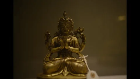 Gold statue in cabinet Video stock 285475147