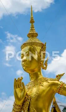 Gold statue at wat phra kaew Stock Photos