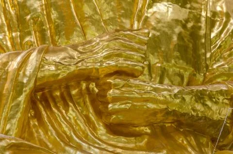 Gold stranglehold of buddha statue Stock Photos