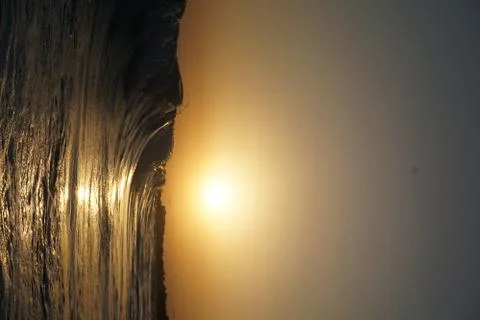 Gold sunset wave Stock Photos