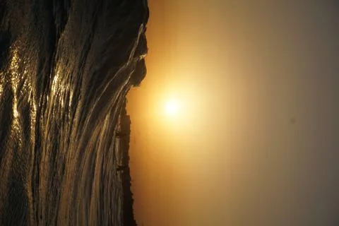 Gold sunset wave Stock Photos