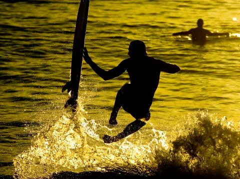 Gold surfer Stock Photos